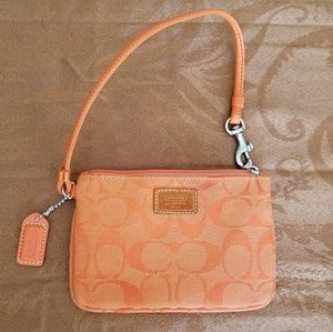 Coach Orange Jacquard Monogrammed Wristlet